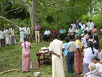 Villagers attending the water society meeting at the site discussing the next phase of the project